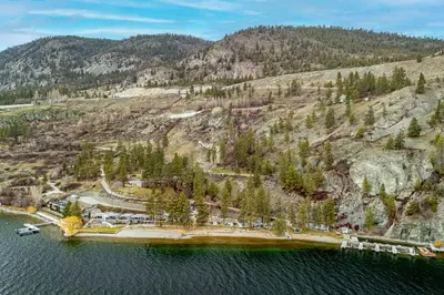 an aerial view of a resort on the water at Lakeside Serenity Retreat #10 in West Kelowna