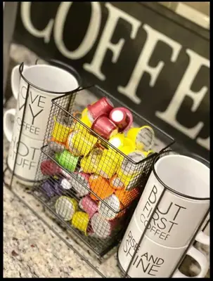 a basket of candy next to two coffee cups at Best home with lake view in Edmonton