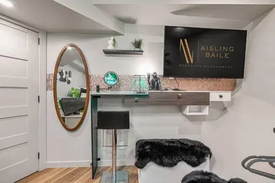 a bathroom with a dressing table and a mirror at Dome House YYC, Iconic, Luxury, Backyard Oasis in Calgary