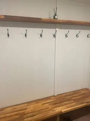 a white wall with four pairs of scissors on it at Ski-In Chalet: Private Hot tub, Bonus Bunk House in Fernie