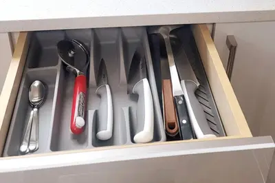 a drawer filled with utensils in a cabinet at Gorgeous 2 Bedrooms Suite Private entrance with patio-Free Parking in Maple Ridge District Municipality