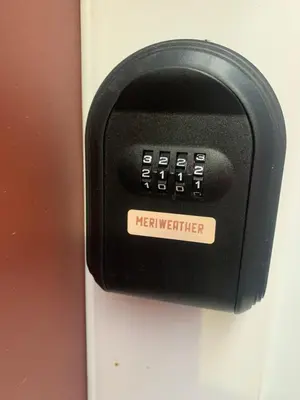 a dispenser on a door with the words hereafter at Meriweather - Calgary Breathtaking 1-bedroom apartment in Calgary
