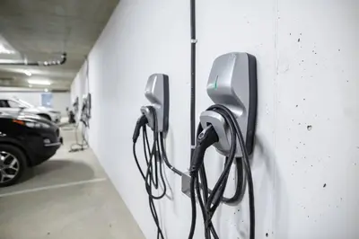 a group of phones hanging on a wall in a garage at Brand New Penthouse with Lake and Mtn Views in Harrison Hot Springs
