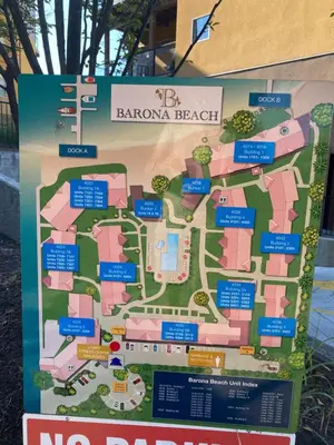 a sign with a map of a resort at Condo at Barona Beach Lakeside Resort in West Kelowna