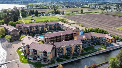 an aerial view of an apartment complex at Condo at Barona Beach Lakeside Resort in West Kelowna