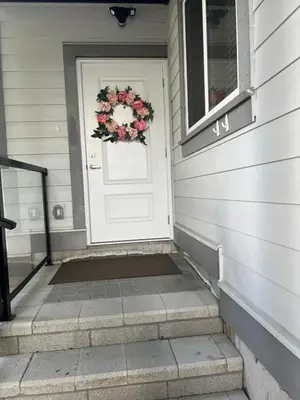 a wreath on the front door of a house at Fort Langley Homestead in Maple Ridge District Municipality