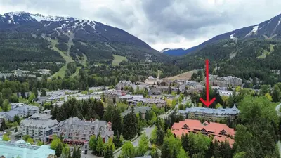 an aerial view of a resort in the mountains at KING Bed - Premium STUDIO Suite - Ski Valet - Village in Whistler