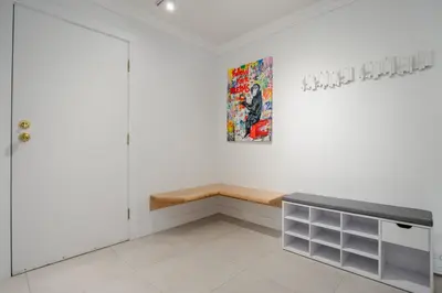 a room with a counter and a painting on the wall at 4BR in Blueberry Hill Estates, Mountain Views, Large Family Home, Wood Fireplace, Balcony in Whistler