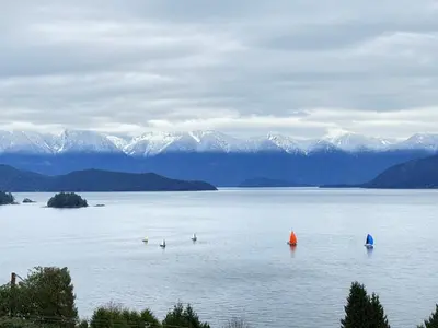 a large body of water with boats in it at Blue House in Gibsons