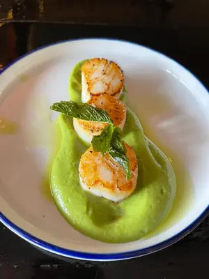 a plate of food with shrimp and green sauce at Shannaghs Sweet Escape in Powell River