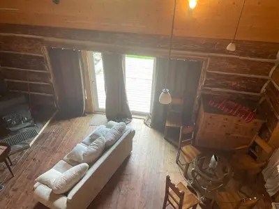 an overhead view of a living room with a couch at Rustic Dream Cabin at Beaverfoot in Parson