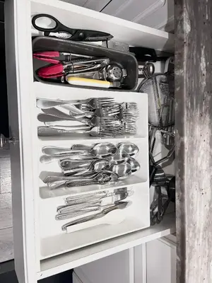 a drawer filled with lots of silver utensils at Spacious & Comfy Upper Floor 3BR Suite in Detached House in Calgary