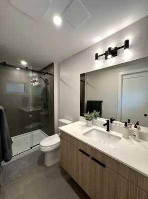 a bathroom with a sink and a toilet and a shower at Private Hot Tub Ski In Ski Out Sleeps 9 in Panorama