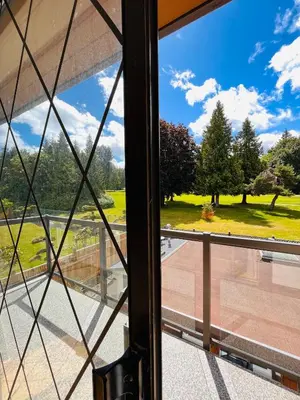 a view from a window in a building at Oceanside Manor - Fancy Room - Golf course & Beach View in Qualicum Beach