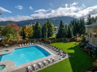 an image of a swimming pool in a yard at Cascade Lodge Premium Suite, with Pool & Hot Tub in Whistler