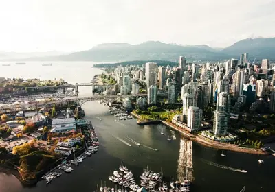 an aerial view of a city with a harbor at The Altitude with Mountain & City Views, Pool & Hot Tub in Vancouver