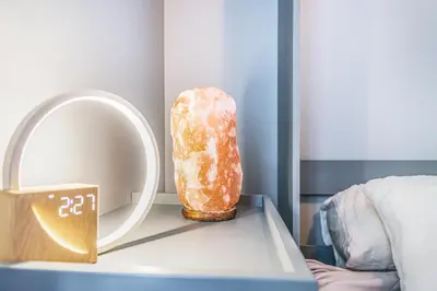 a donut sitting on a table next to a mirror at Entire home minutes from 3 lakes and a river! in Nanaimo
