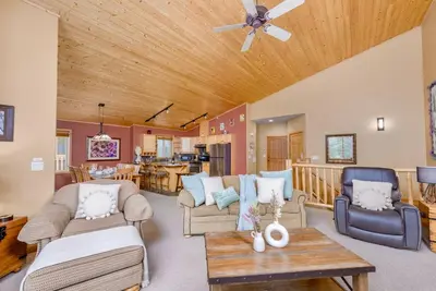 a living room filled with furniture and a ceiling at Best Ski-in out 3 Bdrm Chalet, with Hot Tub in Big White