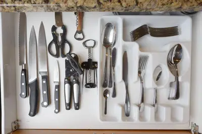 a bunch of utensils sitting on a white tray at Best Ski-in out 3 Bdrm Chalet, with Hot Tub in Big White
