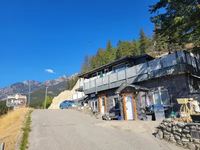 a building on the side of a road at Cross Suite - MistyRiver Lodge in Radium Hot Springs