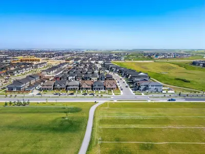 an aerial view of a road with houses at Large House Near Calgary Airport with Central AC, Double Car Garage Parking, Upgrade Stay, Netflix, Sleeps 8 in Calgary