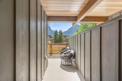 a hallway of a house with a view of a mountain at Luxe Retreat by Canadian Rockies Vacation Rentals in Canmore