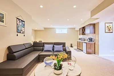 a living room with a couch and a table at sweet home in Calgary