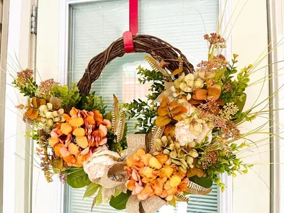 a wreath with flowers on a window at Langley Heights 2 Bedrooms Sweet Suite in Langley