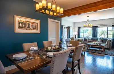 a dining room with a table and chairs at Downunder Mountain Retreat in Revelstoke