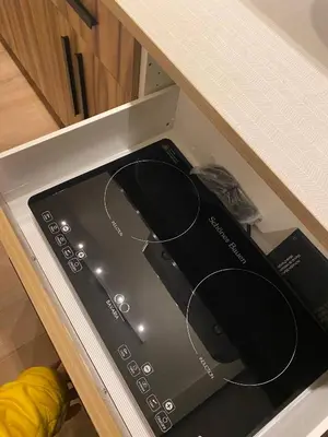 a toaster oven sitting in a drawer in a kitchen at Guest Suite Close To Whtye Ave in Edmonton