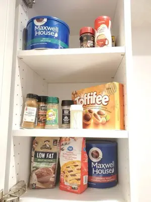 a refrigerator filled with lots of food and drinks at Cozy suite, Free WIFI , Free Parking in Calgary