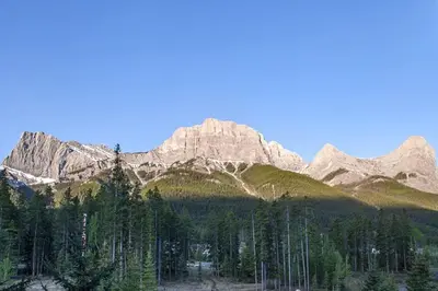 a mountain range with trees in front of it at Worldmark Canmore Banff Alberta Canada in Canmore