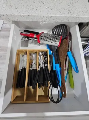 a drawer filled with lots of kitchen utensils at Entire guest suite in Cochrane, AB in Cochrane