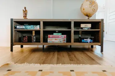 a book shelf with books on it in a room at Central Calgary & Nearby Mountain Escape - 4 Beds in Calgary