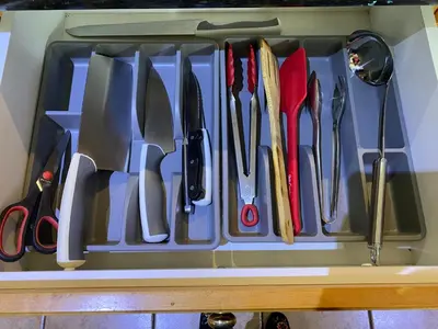 a drawer filled with lots of utensils at 7 Bedrooms in the Heart of Vancouver in Vancouver