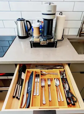 a drawer filled with utensils on a kitchen counter at LuxQuarters Bumbleberry Guest House in Kitimat
