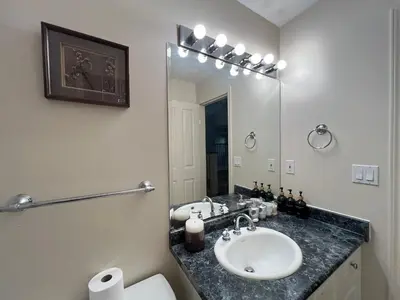 a bathroom with a sink and a mirror at Terra Nova - Private property in Richmond