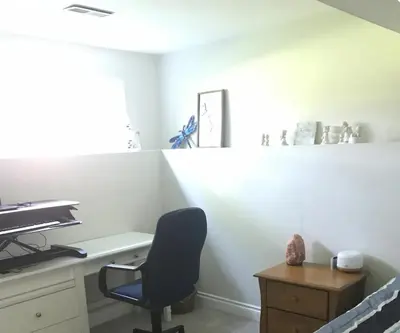 an office with a desk and a chair in a room at The Musical Perch in Kelowna