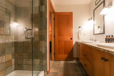 a bathroom with a shower and a sink at Slalom Creek 3 Bedroom in Rossland