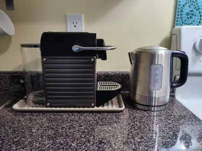 a black appliance sitting on top of a counter at Angela's Private Suites in Surrey
