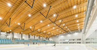 a person skating on a rink in an indoor arena at Angela's Private Suites in Surrey