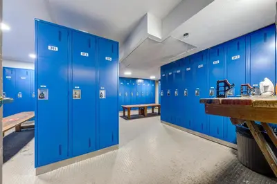 a blue locker room with blue lockers at Greystone Lodge 214 Ski-in Out in Whistler