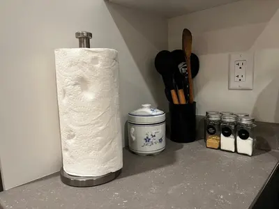 a roll of paper towels sitting on top of a counter at Brand new suite in langley close to everything in Langley