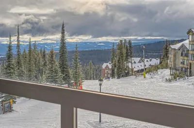 a view from a balcony of a ski resort at Stonegate Resort Unit B204 in Big White