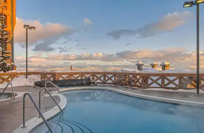 a swimming pool on top of a building at Stonegate Resort Unit B204 in Big White