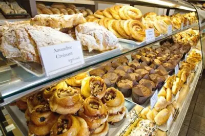 a bakery filled with lots of different types of pastries at Urban Jungle Getaway, AirCon, 10min to DT & WEM! in Edmonton