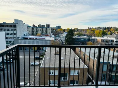 a view of a city from a balcony at 7th Floor 1 Bedroom Condo with Parking in Calgary