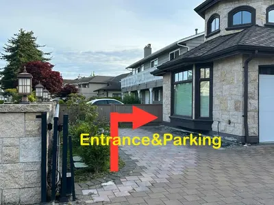 an image of a house with an entrance and parking sign at \u8212\u9002\u5927\u5e8a\u5957\u623f in Richmond