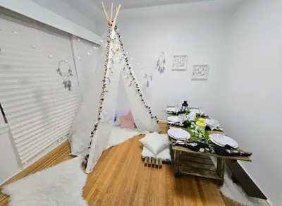 a room with a tent in the corner of a room at Spacious Private Cozy 2br Home with TeePee Dining Room! Private Parking! Self Check-in in Burnaby