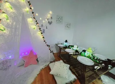 a dining room with two tables and a star at Spacious Private Cozy 2br Home with TeePee Dining Room! Private Parking! Self Check-in in Burnaby